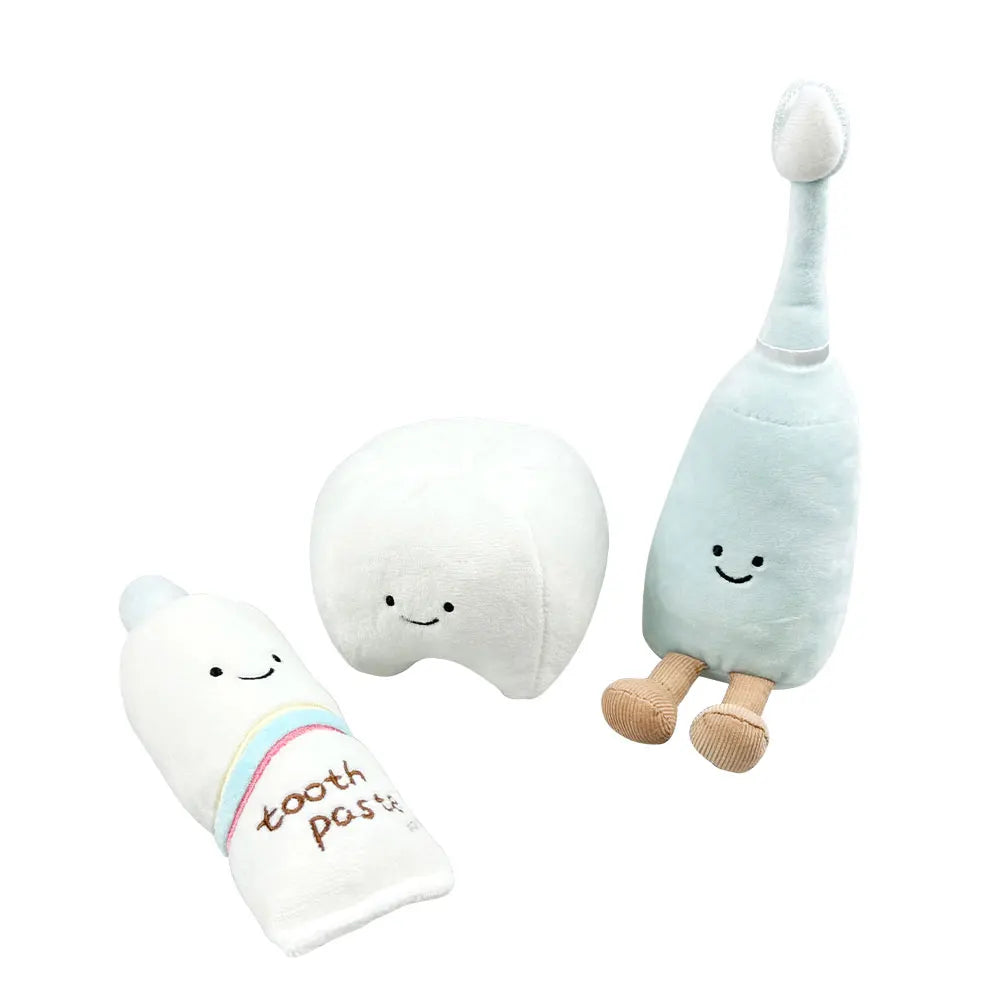 Playful plush dentist doll set featuring toothbrush, toothpaste, and tooth characters.