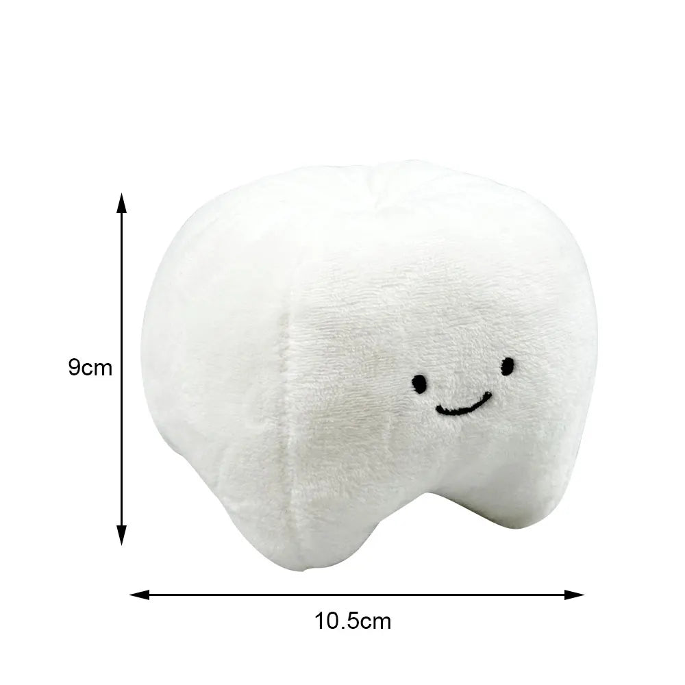 Soft plush tooth toy for kids, promoting dental care and play, part of the BRUSHiE Dentist Doll collection.
